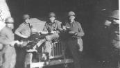 Chow time on the road. Hq 2d Bn 254th Inf
